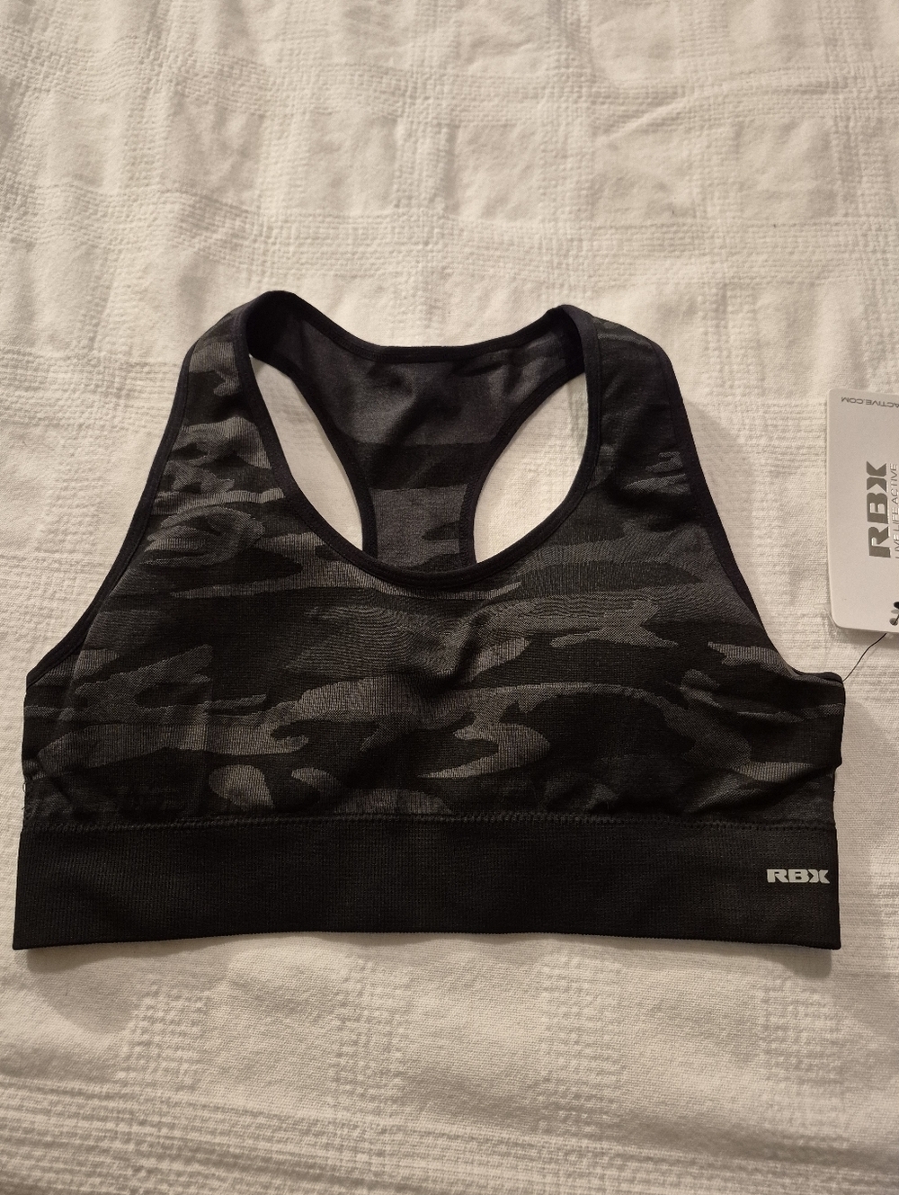 RBX women's Medium sports bra, black & gray camo design NWT